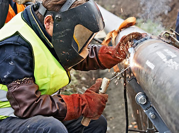 Construction worker welding