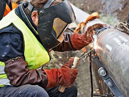 Man Fixing Pipe