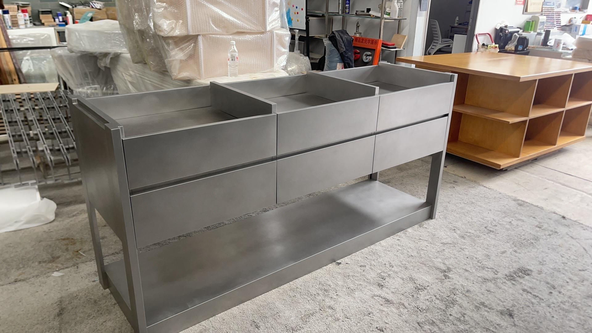 A long display table, suitable for storing clothes