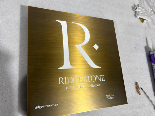 Ptinable Rode Gold Work Signs Stainless steel sign, gold-plated brushed effect | Twinkle Display Prop