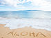 the-word-aloha-written-in-sand-at-the-beach-2023-11-27-05-24-39-utc.jpg