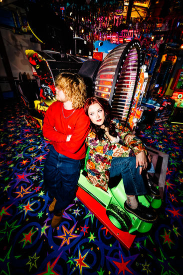 Christina Cook Cooper Ryckman editorial photoshoot portrait photography night arcade couple fashion model fun games creative