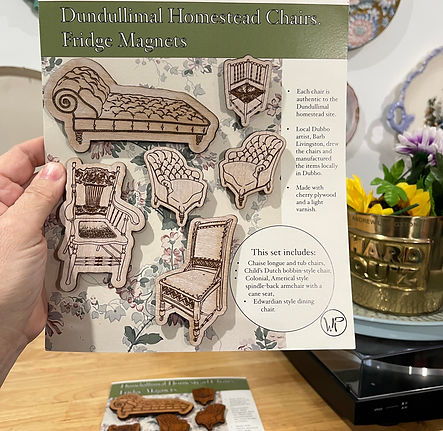 6 Antique chair Fridge magnets set out on Cardboard packaging with th e wallpaper pattern from Dundullimal Homestead.