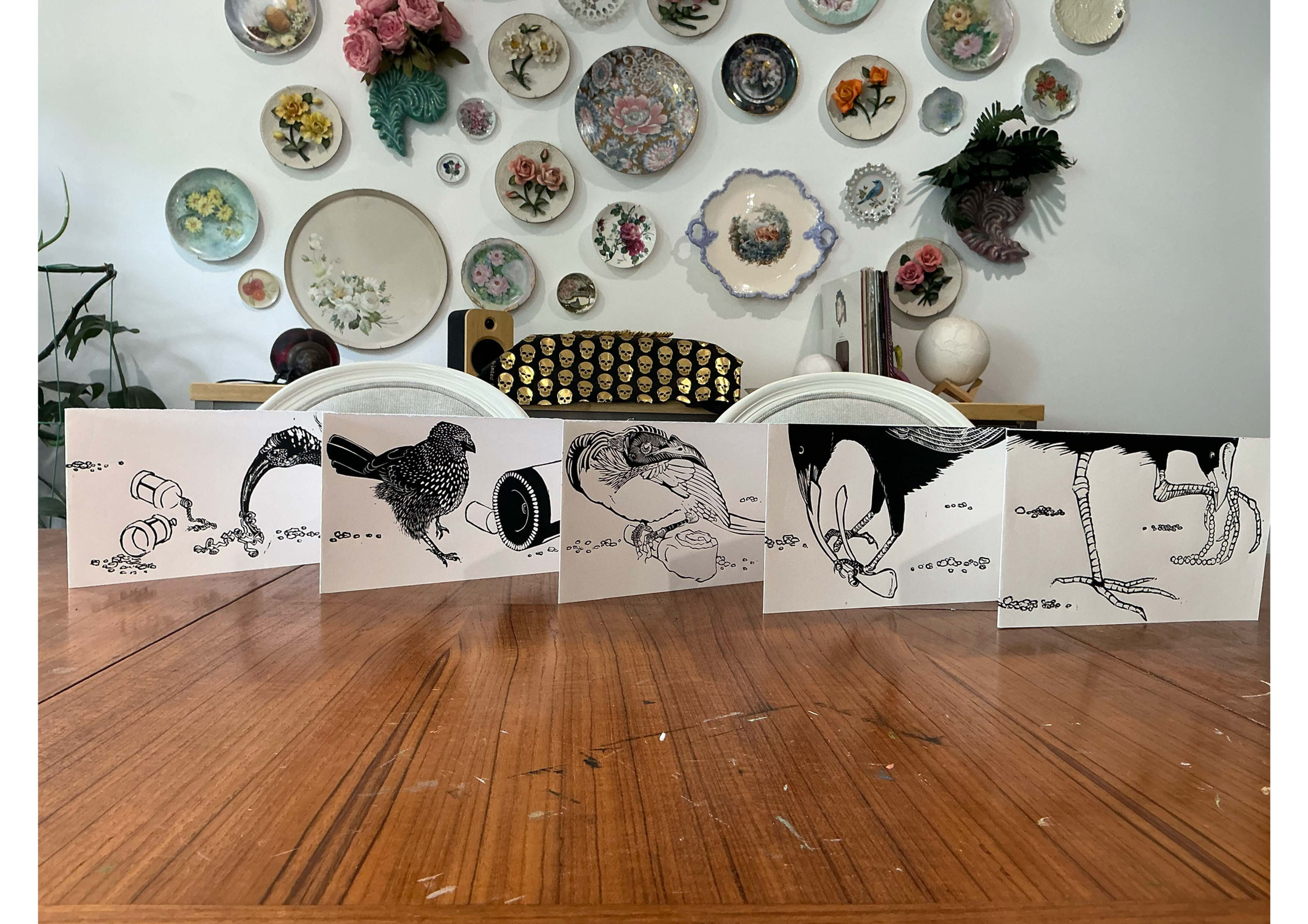 In the tradition of the great printmaker Eric Thake, I created Holiday/Celebration card Lino prints. I have chosen to copy the size of his prints, the tongue in cheek humour and the black and white paired-down style of his works. “With a pencil” celebration edition plays with the detritus of human fun, all various elements and recognisable of people partying. Their interaction with these special items focusses our attention on the waste and items we give meaning to, but then cast away. The birds are the conscience or a state of mindfulness about our choices.
Each of the birds are Dubbo locals, they are common in our yards and the surrounds filling the air with their calls and delighting when they make an appearance. It was. a pleasure to observe their details and render them in a Lino print edition.