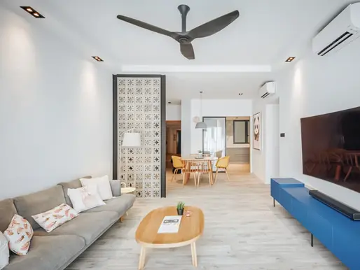 Modern living room with minimalist Scandinavian furniture, neutral color palette, and natural wood accents, reflecting modern interior design style.