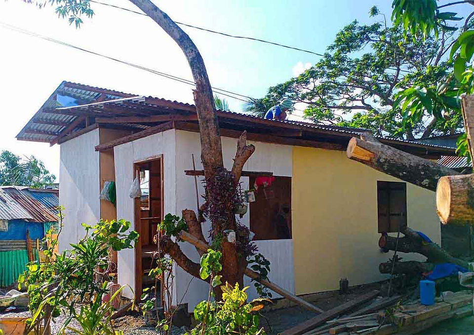 A newly built house by Abounding in Love for the Filipino family who lost their homes after typhoon odette.