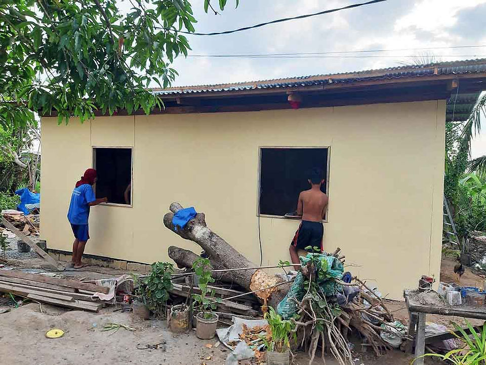 A new home built by Abounding for a Filipino family who lost their home during typhoon.