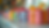 Close-up of a colorful party favor table with gift bags and ribbons