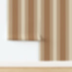 Brown and beige striped wallpaper partially unrolled against a white wall, wooden floor visible at bottom, no text present.