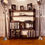 Thumbnail: Antique ebonised pegged plank open bookcase with carved relief - #8576