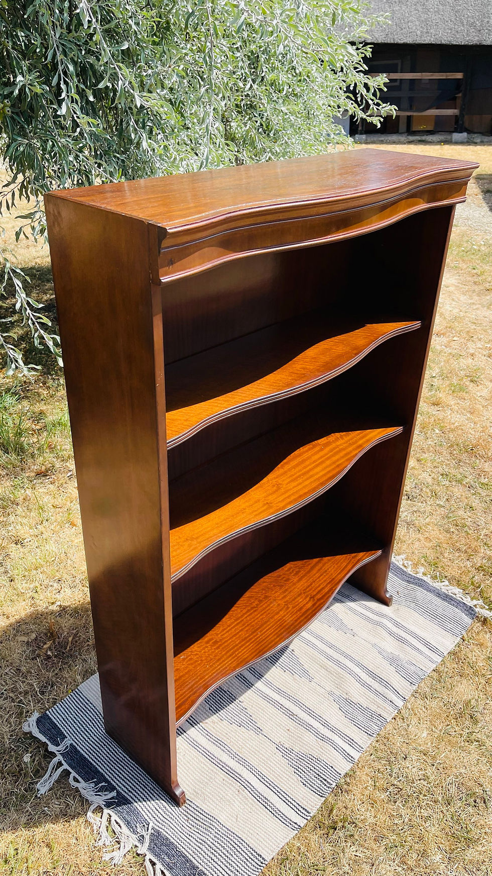 Thumbnail: Mahogany serpentine front open bookcase #9226