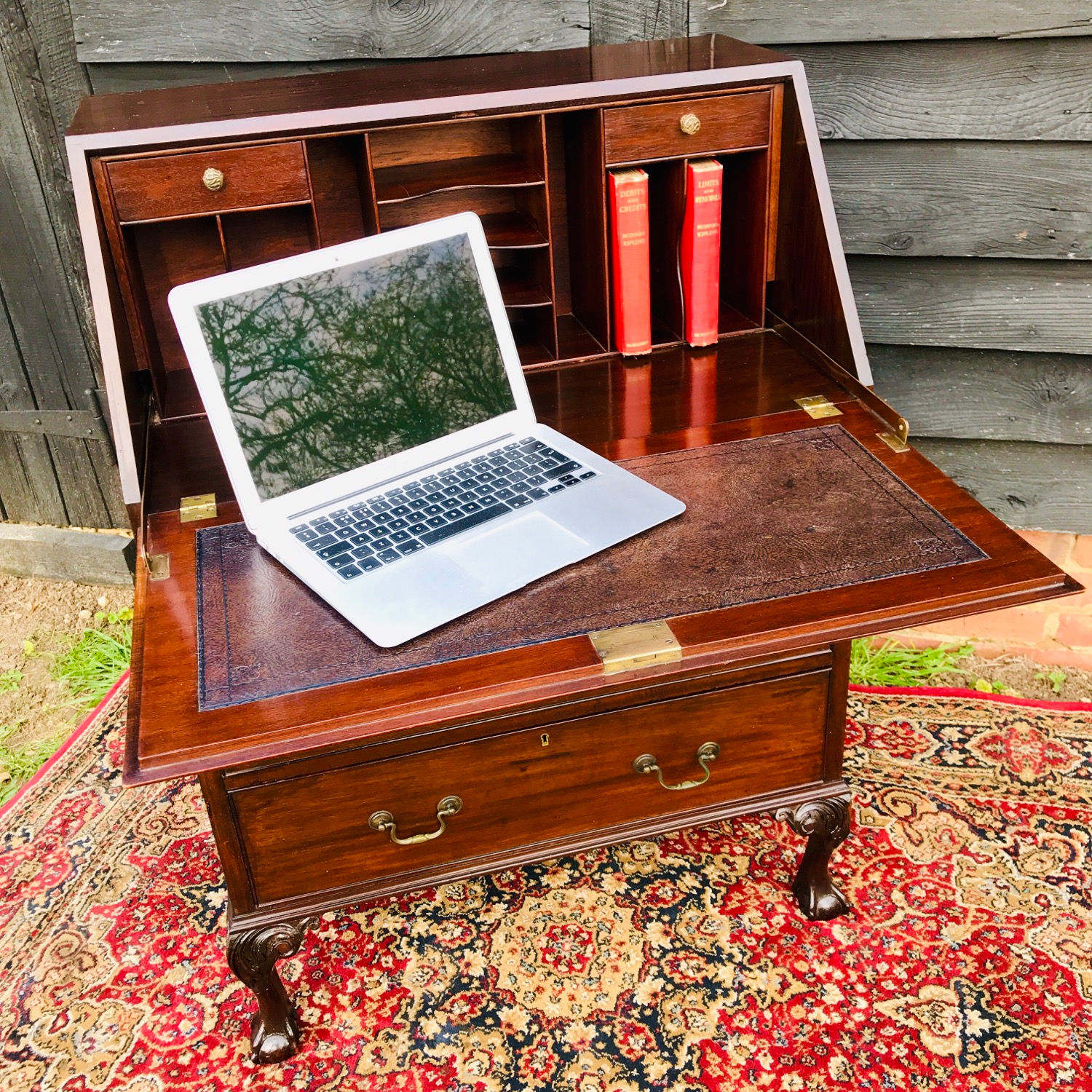 A smart Edwardian fall front mahogany bureau on cabriole ball & claw supports.