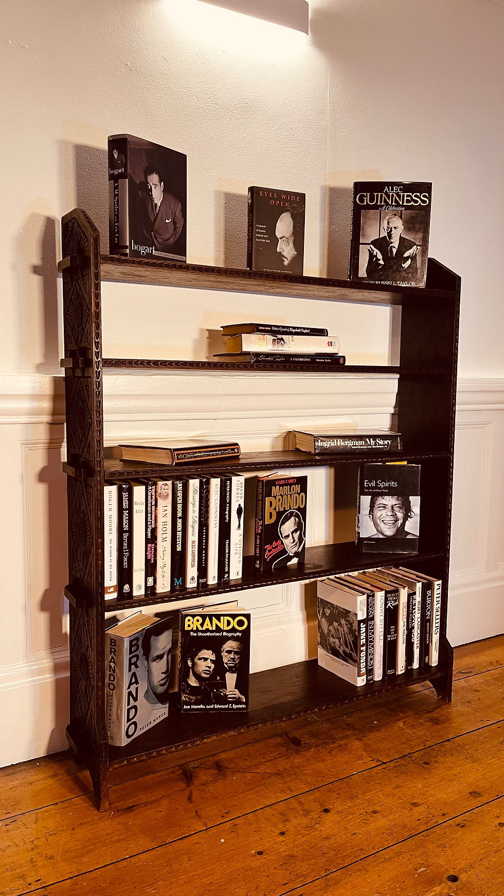 Thumbnail: Antique ebonised pegged plank open bookcase with carved relief - #8576
