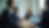 Eye-level view of a business meeting discussing marketing costs