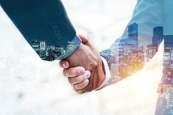 welcome-double-exposure-business-man-partner-handshake.jpg