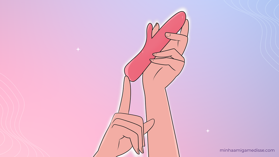 Uma mão segurando um vibrador tipo rabbit