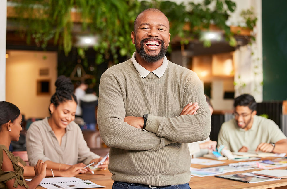 black-man-portrait-smile-and-arms-crossed-in-lead-2023-11-27-05-15-38-utc.jpg