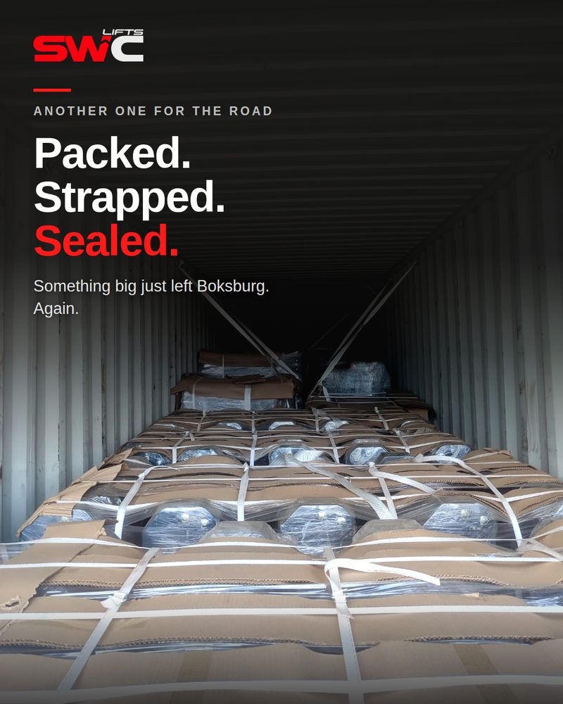 A container being packed with SWC Lifts SCL500 tail lifts for export