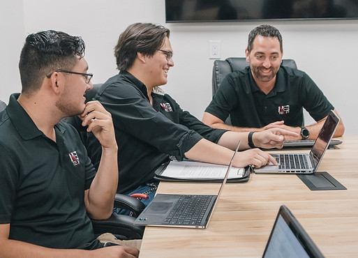 Nathan and Staff in a Meeting