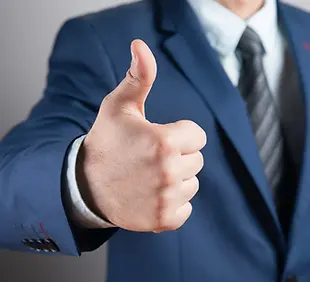 thumbs-up-man-suit.webp