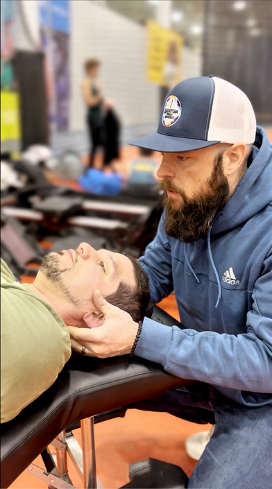 Quantum Chiropractic Hershey Chiropractor Dr. Noah Frey Adjusting Patient