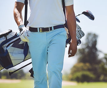 Man Carrying Golf Bag_edited.jpg