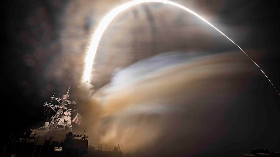 A warship launches a missile at night, creating a bright arc against a smoky sky. The scene is dramatic, with the ship partially visible.