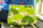 front view of pochette gamaguchi bag