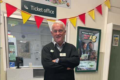 Darrell stands in front of Arundel Train Station Ticket Office. 