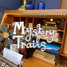 A close up of a The Writer of Horsham's desk, filled with clues to help solve the mystery of their disappearance. 