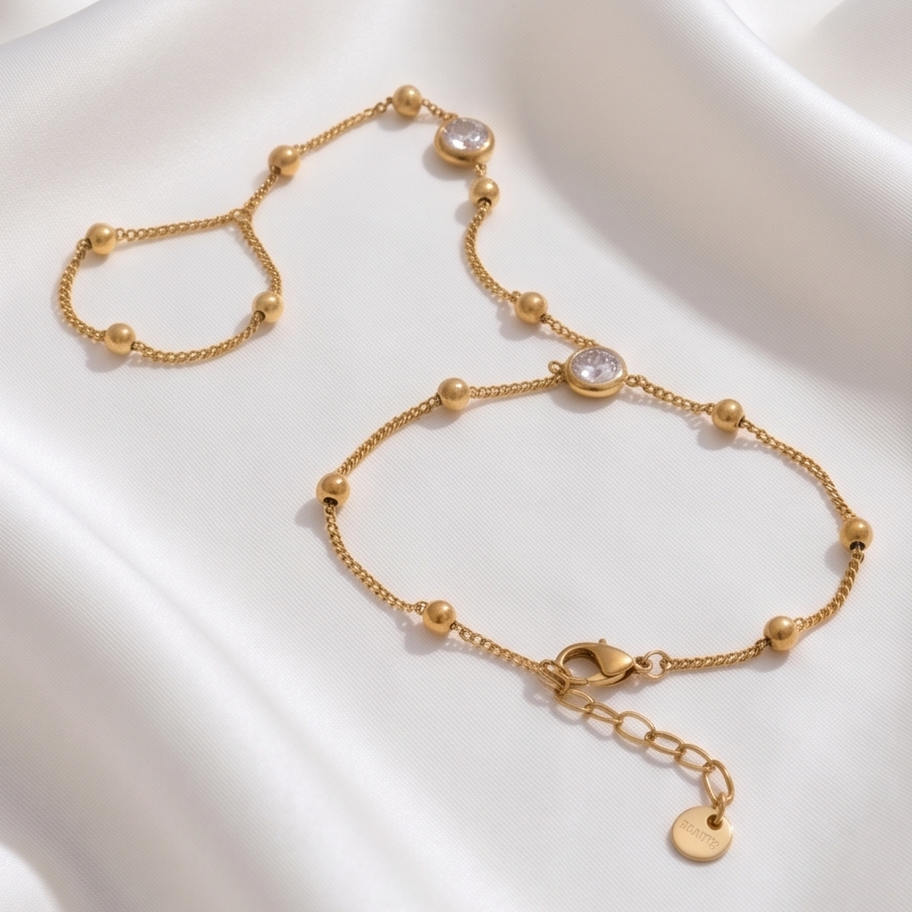 Slavenarmband of handchain met zirkoon goudkleurig