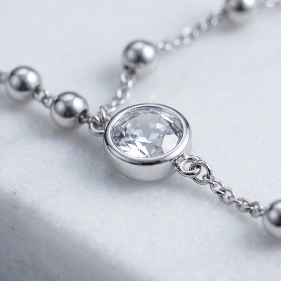 Slavenarmband of handchain met zirkoon zilverkleurig