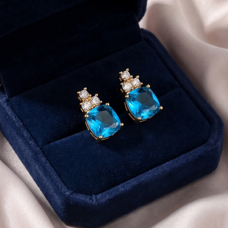 Kleine oorbellen met Aqua zirkoon