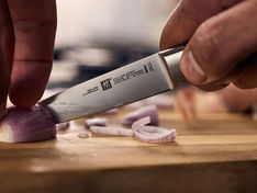 chef-using-paring-knife