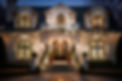 professional holiday lighting and decorations on a suburban home