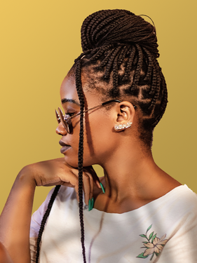 Knotless braids are box braids installed using a different technique to lessen scalp tension and create a more natural look. This braided hairstyle will begin at the root just like regular box braids but will start with your natural hair, then eventually feed in the hair extension as the braid continues.