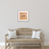 Thumbnail: Fine art print framed with passepartout above boho wooden bench on a beige wall. Print of painting of a bee on gold leaf