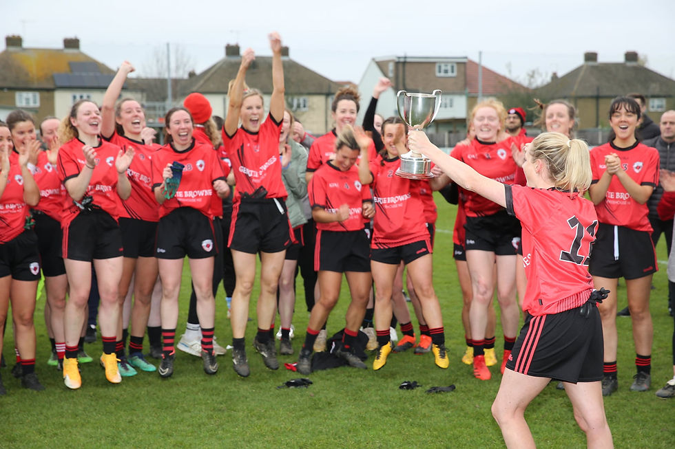 Captain Emma Mulhern lifts the All-Britain Cup
