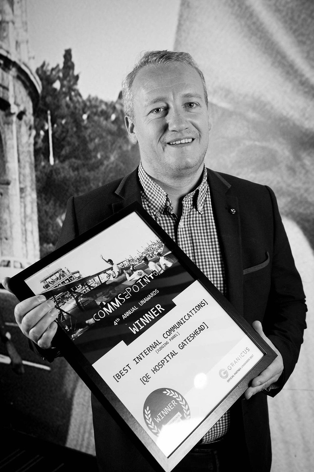 Ross Wigham winning an award for internal communications. (Picture with courtesy of Comms2point0 unawards)