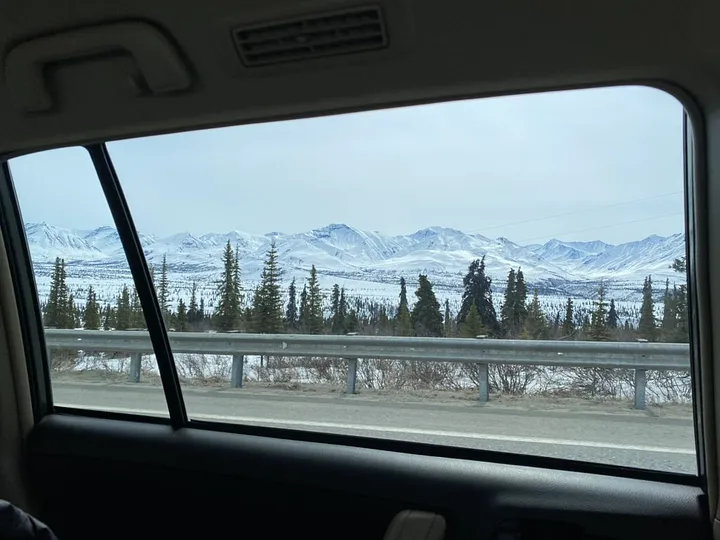Scene of Alaskan mountains out the car window