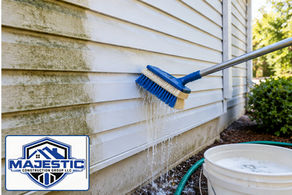 Illustrative How to Clean Vinyl Siding Safely From Ground Level with original blue Majestic Construction Group LLC shield logo visibly displayed