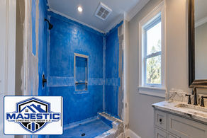 Illustrative Bathroom Remodeling in Mississippi: Why Waterproofing and Ventilation Must Work Together with original blue Majestic Construction Group LLC shield logo visibly displayed