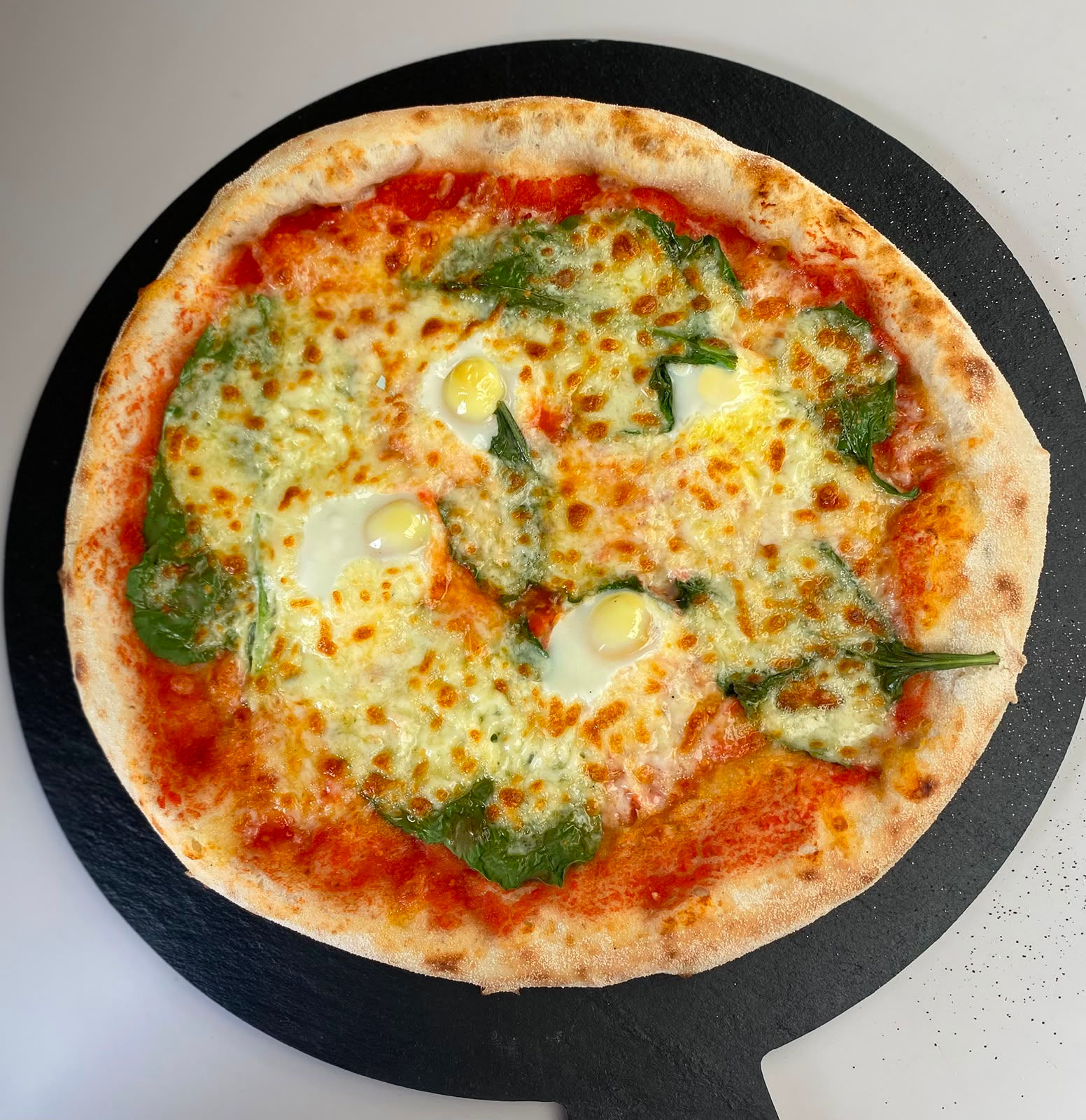 Spinach and egg pizza (v)