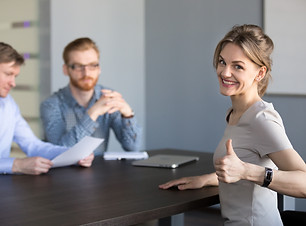 Happy millennial applicant showing thumb