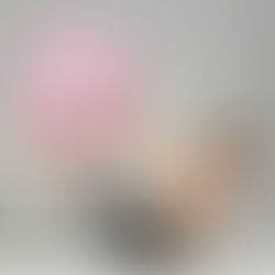 Woman holding exercise ball.