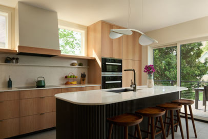 a modern kitchen with warm wood