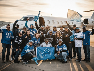 A large group of 20 Detroit Lions fans, wearing team jerseys and holding flags, smiling and posing for a group photo in front of a private jet on a tarmac at sunset. This image represents the ultimate fan experience of chartering a private flight for an away game.