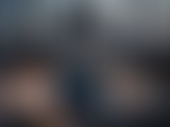 Tablet displaying stock market charts on a conference table in a modern office at dusk, with financial indicators, coffee cup, notebook, and city skyline in the background. Branded with 'Stalt Financial – Planning & Wealth Management.