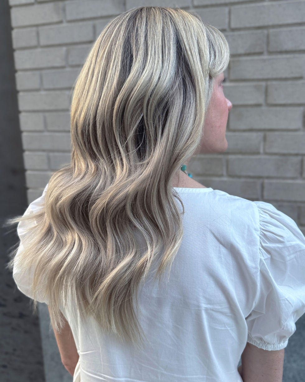 Fine hair extensions client in Alexandria, VA after beaded weft appointment