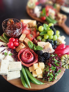 Holiday charcuterie grazing table with seasonal fruits and cheeses – Dallas TX